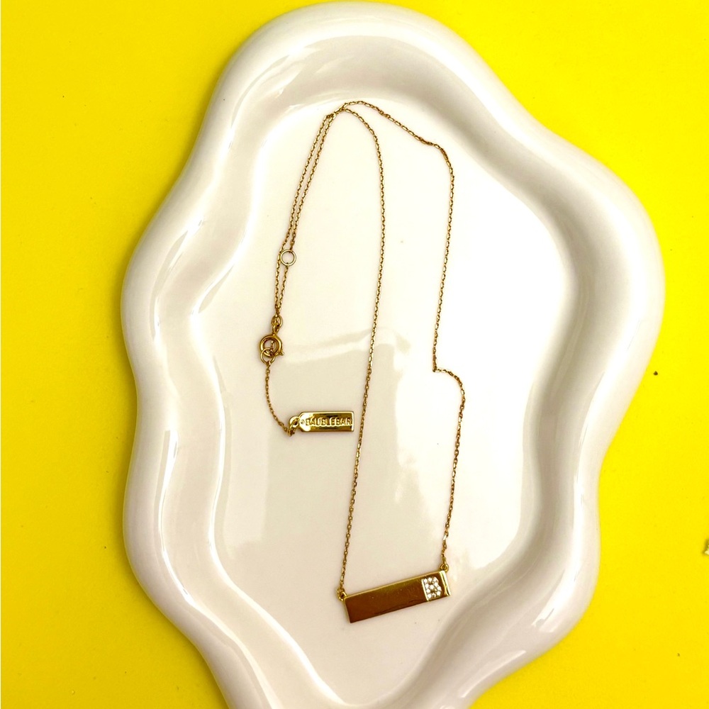 Elegant gold bar necklace with sparkling cubic zirconia accents — Initial “B”